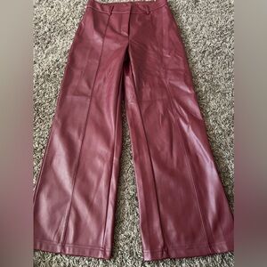 Burgundy faux leather pants